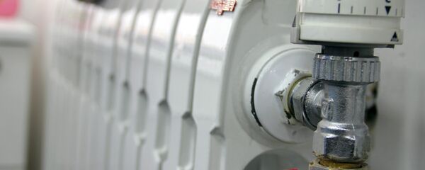 Батарея центрального отопления. Архивное фото Батарея центрального отопления. Архивное фото - Sputnik Кыргызстан