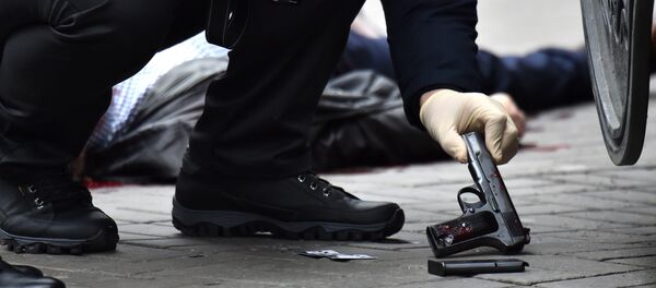 Пистолет на месте убийства. Архивное фото - Sputnik Кыргызстан