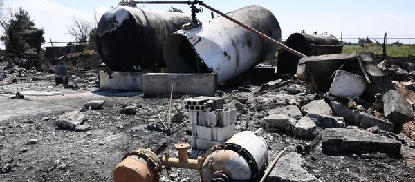 Последствия ракетного удара США по авиабазе в Сирии - Sputnik Кыргызстан