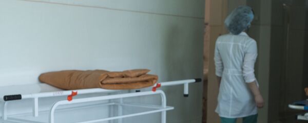 Медсестра в коридоре больницы. Архивное фото - Sputnik Кыргызстан