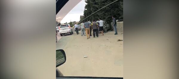 Разбитая спецмашина, патрульный без сознания — кадры из Чолпон-Аты - Sputnik Кыргызстан