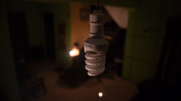 Лампочка в комнате. Архивное фото - Sputnik Кыргызстан