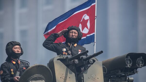 Военнослужащие на бронетранспортере во время военного парада в Пхеньяне. Архивное фото - Sputnik Кыргызстан