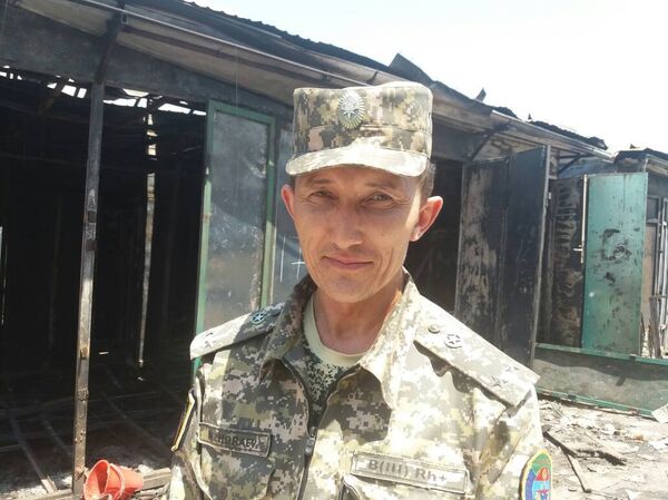 Старший инспектор Управления государственной противопожарной службы города Оша майор Музаффар Жороев - Sputnik Кыргызстан