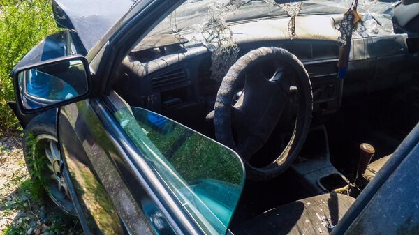 Автомобиль поврежденный в ДТП. Архивное фото - Sputnik Кыргызстан