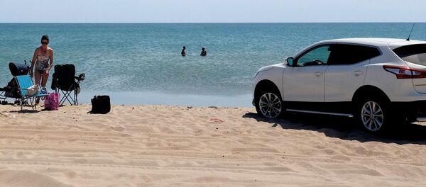 Отдых на Бугазской косе в поселке Веселовка Отдых на Бугазской косе в поселке Веселовка - Sputnik Кыргызстан