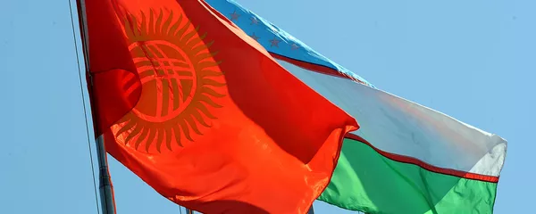 Флаги Кыргызстана и Узбекистана. Архивное фото - Sputnik Кыргызстан