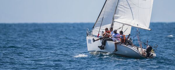 Регата посвящена памяти основателя парусного спорта в Кыргызстане Александра Сахарцева на Иссык-Куле - Sputnik Кыргызстан