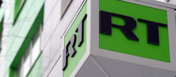Логотип телеканала Russia Today. Архивное фото - Sputnik Кыргызстан