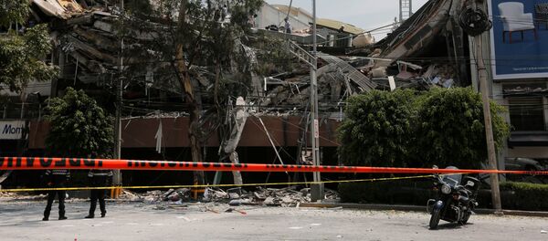 Последствия сильного землетрясения в Мехико Последствия сильного землетрясения в Мехико - Sputnik Кыргызстан