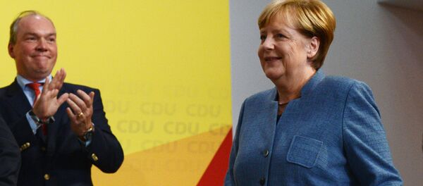 Германиядагы парламенттик шайлоодо канцлер Ангела Меркелдин блогу — Германиянын христиандык-демократиялык союзу добуштардын 33 пайызын алып, жеңишке жетти. - Sputnik Кыргызстан
