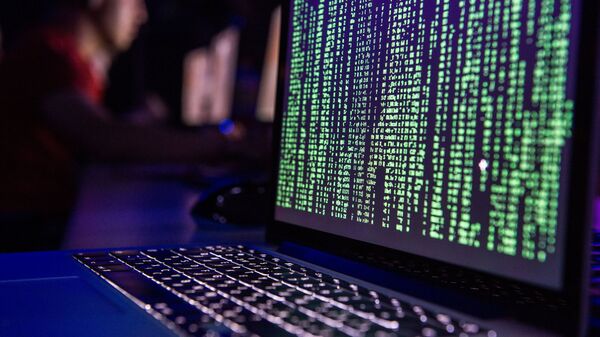 Экран ноутбука демонстрирует случай хакерской атаки. Архивное фото - Sputnik Кыргызстан