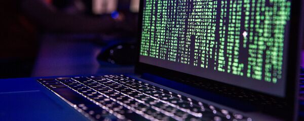 Экран ноутбука демонстрирует случай хакерской атаки. Архивное фото - Sputnik Кыргызстан
