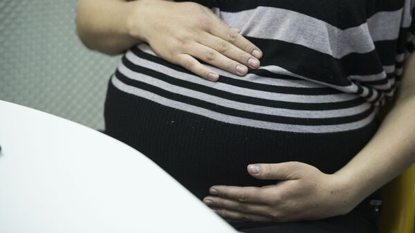 Беременная женщина. Архивное фото - Sputnik Кыргызстан