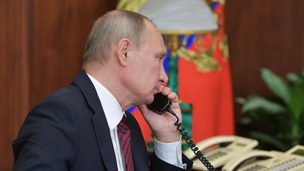 Президент РФ В. Путин провел телефонный разговор с главами ДНР А. Захарченко и ЛНР И. Плотницким - Sputnik Кыргызстан