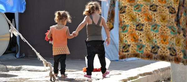 Лагерь беженцев в Латакии - Sputnik Кыргызстан