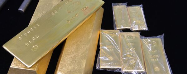 Золотые слитки. Архивное фото - Sputnik Кыргызстан