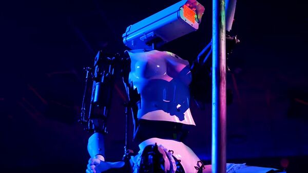 Роботы-стриптизерши исполнили танец на выставке в США — видео - Sputnik Кыргызстан