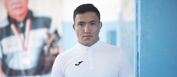 Кыргызстанский борец греко-римского стиля Атабек Азисбеков. Архивное фото Кыргызстанский борец греко-римского стиля Атабек Азисбеков. Архивное фото - Sputnik Кыргызстан