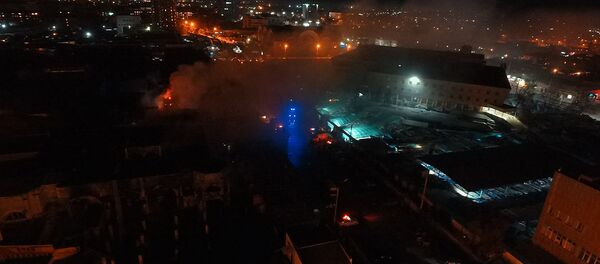 Пожар на Ошском рынке с высоты птичьего полета — видео Пожар на Ошском рынке с высоты птичьего полета — видео - Sputnik Кыргызстан