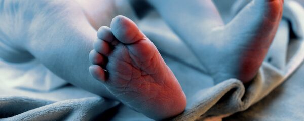 Новорожденный ребенок. Архивное фото - Sputnik Кыргызстан