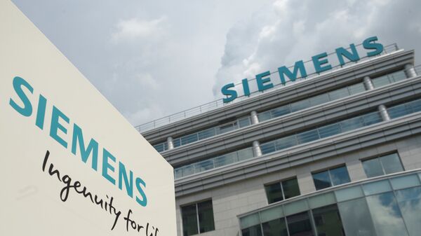 Вывеска на здании компании Siemens. Архивное фото
 - Sputnik Кыргызстан