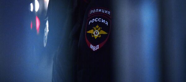 Эмблема на форме сотрудника полиции. Архивное фото Эмблема на форме сотрудника полиции. Архивное фото - Sputnik Кыргызстан