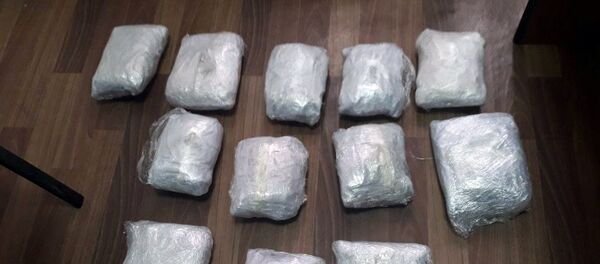 Задержание лиц, занимавшихся перевозкой и сбытом героина в особо крупном размере в Бишкеке - Sputnik Кыргызстан