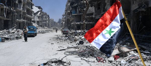 Сирийская армия освободила лагерь палестинских беженцев Ярмук на юге Дамаска Сирийская армия освободила лагерь палестинских беженцев Ярмук на юге Дамаска - Sputnik Кыргызстан
