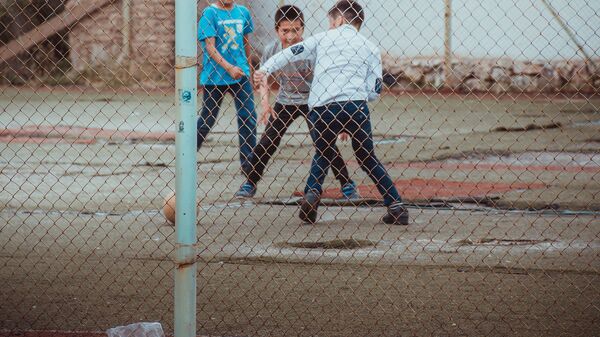 Дети играют в футбол. Архивное фото - Sputnik Кыргызстан