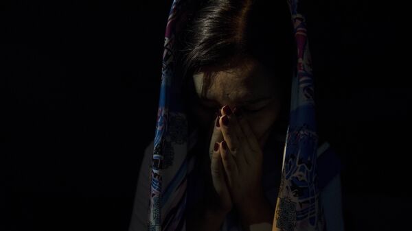 Ыйлап жаткан келин. Архив - Sputnik Кыргызстан