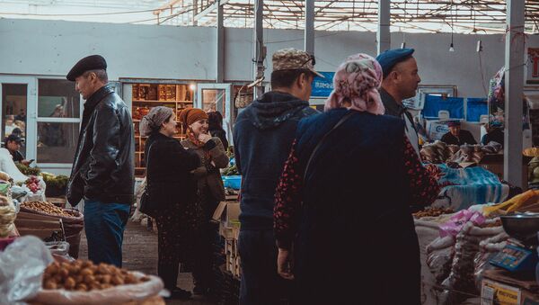 Торговые ряды центрального рынка города в области. Архивное фото - Sputnik Кыргызстан