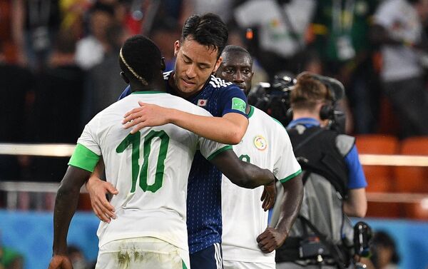 Сборные Японии и Сенегала завершили игру в рамках группового этапа Чемпионата мира по футболу со счетом 2:2. - Sputnik Кыргызстан