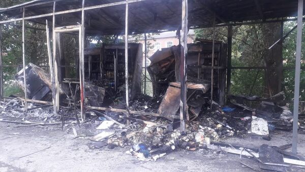 Пожар в торговой точке в Шлиссельбурге, где погиб кыргызстанец - Sputnik Кыргызстан