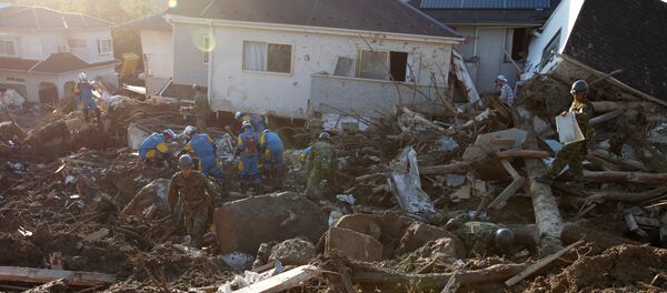 Японияда нөшөрлөгөн жамгырдын кесепеттери - Sputnik Кыргызстан