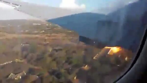 Пассажир самолета снял момент падения на видео - Sputnik Кыргызстан