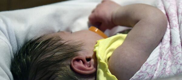 Новорожденный ребенок. Архивное фото Новорожденный ребенок. Архивное фото - Sputnik Кыргызстан