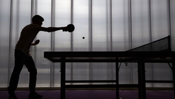 Подросток на соревнованиях по настольному теннису. Архивное фото - Sputnik Кыргызстан