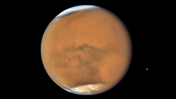 Планета Марс через телескоп Хаббл Марс. Архивное фото - Sputnik Кыргызстан