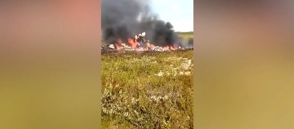 Кадры с места крушения вертолета Ми-8 в Красноярском крае - Sputnik Кыргызстан
