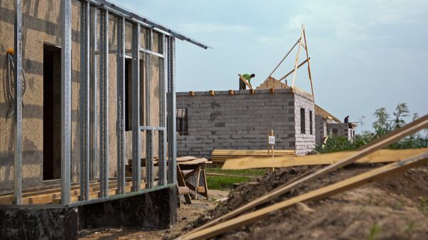 Строительство домов для пострадавших от паводка 2013 г. в Амурской области - Sputnik Кыргызстан