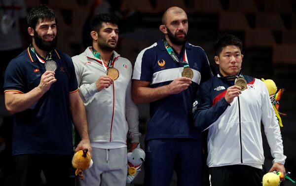 Борец вольного стиля Магомед Мусаев завоевал для Кыргызстана первую медаль в рамках XVIII Азиатских игр - Sputnik Кыргызстан