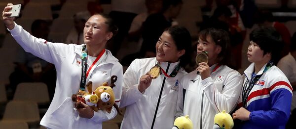 Азиатские игры 2018. Женская борьба до 62 кг. Награждение - Sputnik Кыргызстан