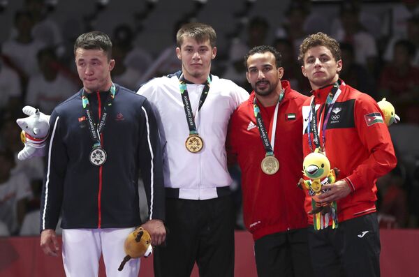 Азиатские игры 2018. Джиу-джитсу 77 кг. Награждение Азиатские игры 2018. Джиу-джитсу 77 кг. Награждение - Sputnik Кыргызстан