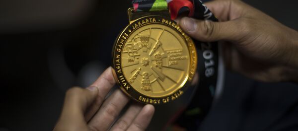 Индонезияда болгон жайкы Азия оюндарынын алтын медалы. Архив - Sputnik Кыргызстан