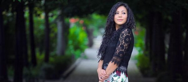 PR-директором Навигатор групп, мать двоих детей Инабат Латипова. Архивное фото - Sputnik Кыргызстан