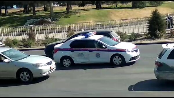 В Бишкеке машина ГУОБДД попала в аварию — видео очевидца - Sputnik Кыргызстан