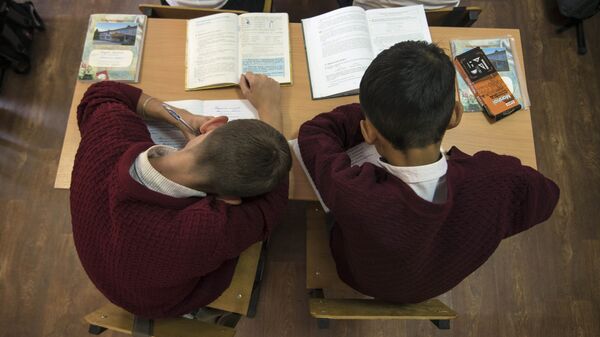 Ученики во время занятий. Архивное фото - Sputnik Кыргызстан