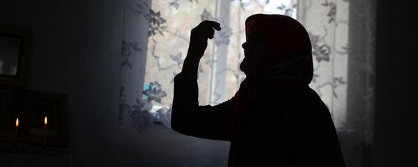 Карыя аял үйдө отурган учурунда. Архив - Sputnik Кыргызстан