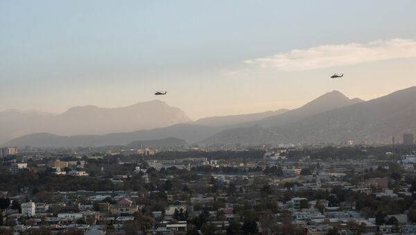 Вертолёты вооруженных сил коалиции в небе над Кабулом. Архивное фото - Sputnik Кыргызстан